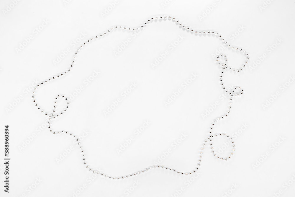 Silver beads, chain of balls. New year decorations on a white background. Christmas concept Silver beads, chain of balls. New year decorations on a white background. Christmas concept