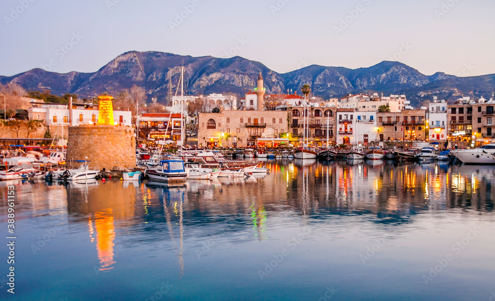 Blue hour view in Kyrenia harbour on . Kyrenia harbor is a famous tourist resort.