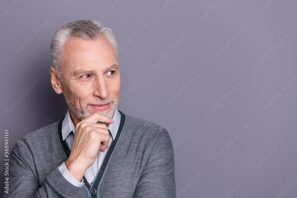 Close-up portrait of his he nice attractive cheerful cheery top hr manager financier economist business shark in casual formal-wear touching chin looking aside isolated over gray pastel background Close-up portrait of his he nice attractive cheerful cheery top hr manager financier economist business shark in casual formal-wear touching chin looking aside isolated over gray pastel background