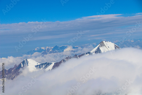 white snow landscape, snowy mountains, winter season, natural landscape, blue sky  © Emin