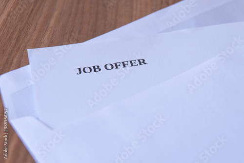 White envelope, containing job offer letter