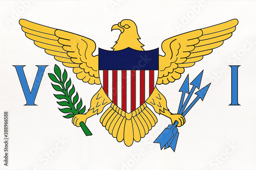 United States Virgin Islands national fabric flag, textile background. Symbol of territory of the United States. photo