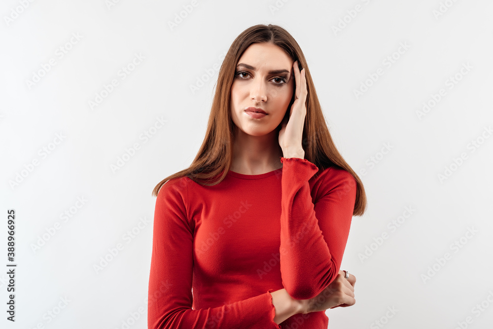 Photo of upset woman grabbing her head and rubbing temples because of headache. Human emotions facial expression concept Photo of upset woman grabbing her head and rubbing temples because of headache. Human emotions facial expression concept