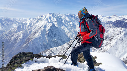 A skier, winter season, enjoying skiing, cold weather, white landscape 