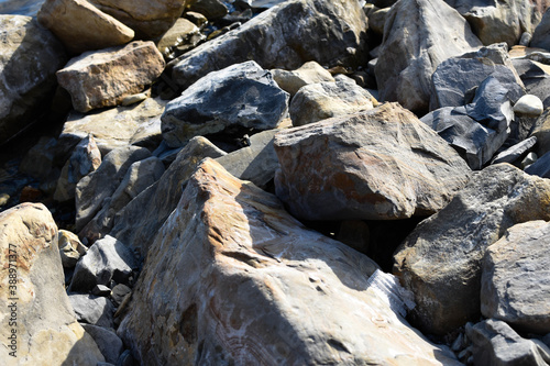 Huge rocks on the beach. Background, texture.