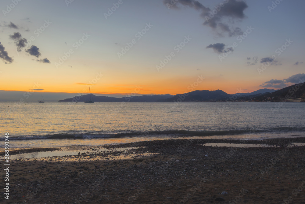 Sunset over the sea in the Bay of Fairy Tales. Sestri Levante, Liguria, Italy
