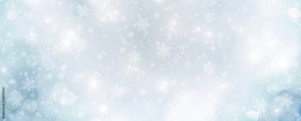 Abstract blue Christmas Winter background banner with snowflakes and beautiful Bokeh light
