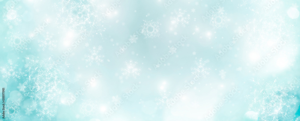 Abstract blue Christmas Winter background banner with snowflakes and beautiful light
