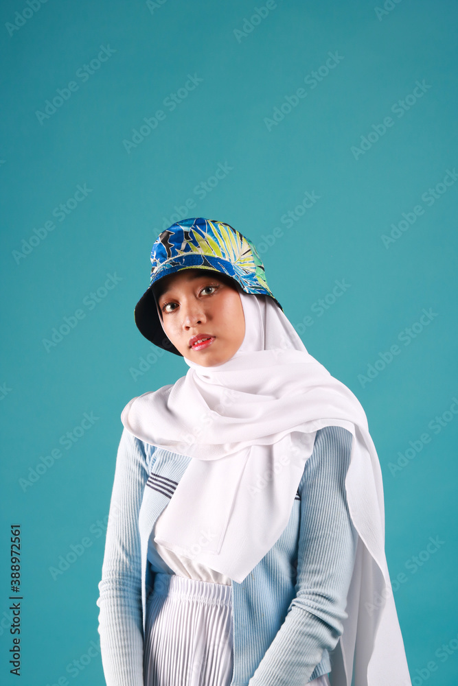 Fashion portrait of young beautiful asian muslim woman with wearing hijab. Fashion portrait of young beautiful asian muslim woman with wearing hijab.