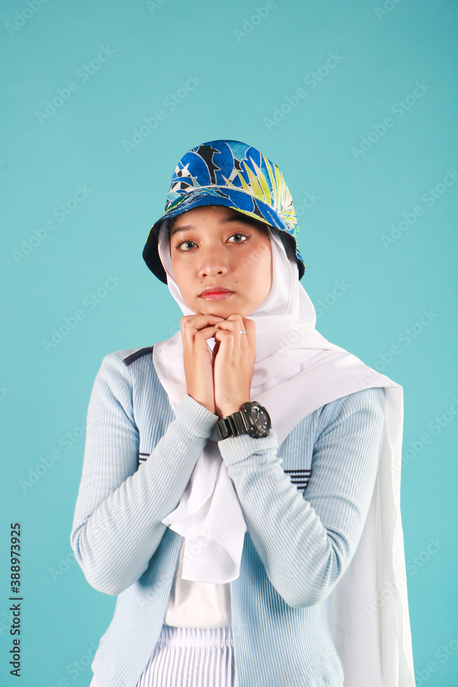 Fashion portrait of young beautiful asian muslim woman with wearing hijab. Fashion portrait of young beautiful asian muslim woman with wearing hijab.