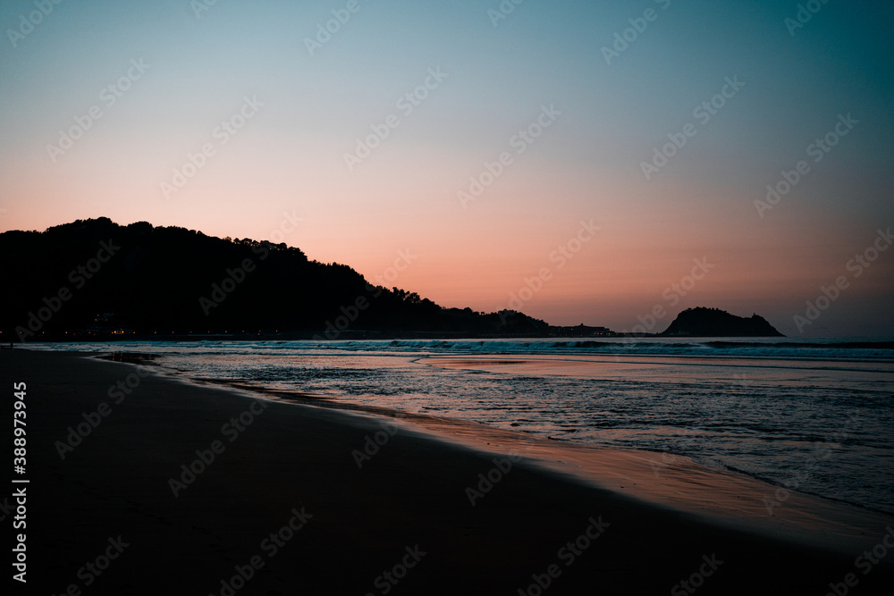 Beautiful beach landscape of the Basque Country Spain. Beach wave textures