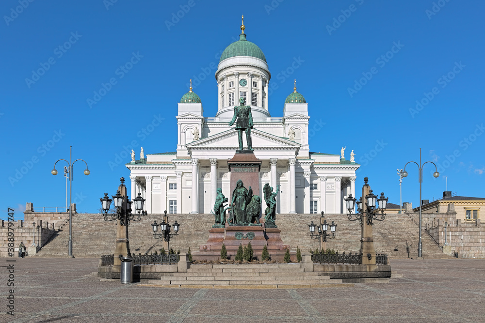 Helsinki cathedral and statue of Emperor Alexander II on the Senate Square in Helsinki, Finland. The cathedral was built in 1830-1852. The statue was erected in 1894.