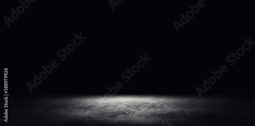 Abstract image of Empty space studio dark room concrete floor grunge texture background.