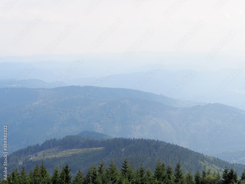 view from the Lysa hora mountain of the mountain landscape on a sunny summer day, hiking and traveling