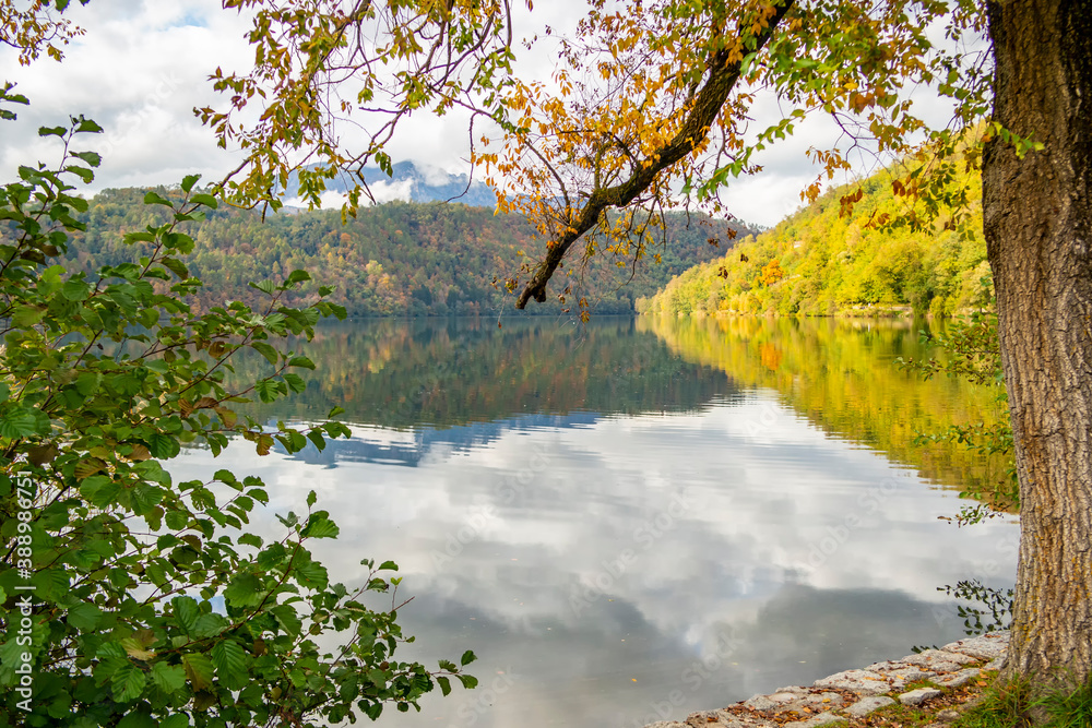 Autumn view on the Levico lake, Trento - Italy Autumn view on the Levico lake, Trento - Italy