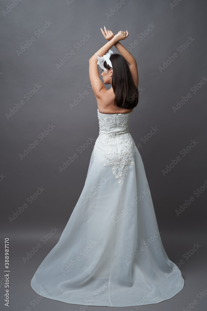 Fototapeta premium Portrait of beautiful young bride wedding dress
