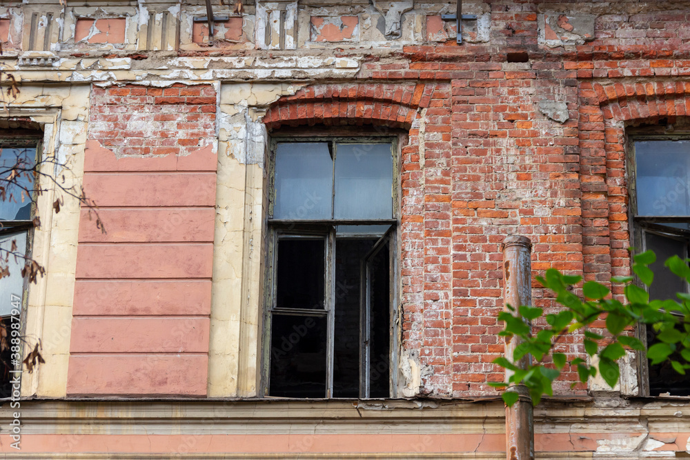 Broken windows in an old abandoned building about to be demolished. Broken windows in an old abandoned building about to be demolished.