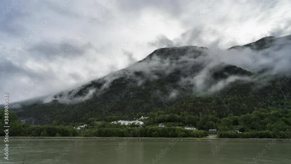 Clouds Moving Low On Green Mountain - Rampestreken Viewpoint In Andalsnes, Norway - timelapse Clouds Moving Low On Green Mountain - Rampestreken Viewpoint In Andalsnes, Norway - timelapse