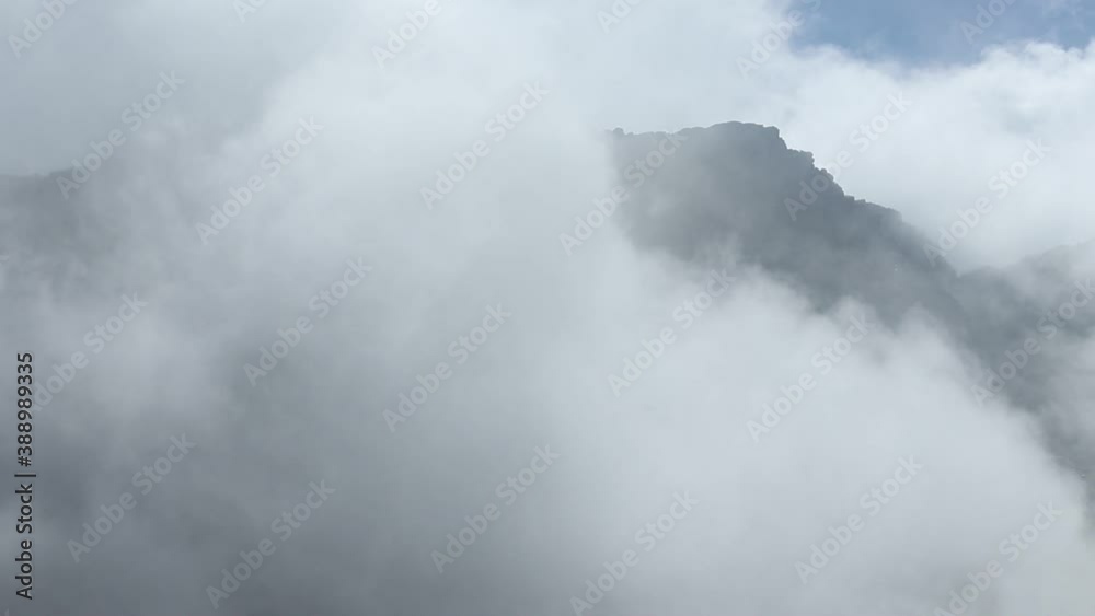 Amazing mountain landscape with fog in summer time Amazing mountain landscape with fog in summer time