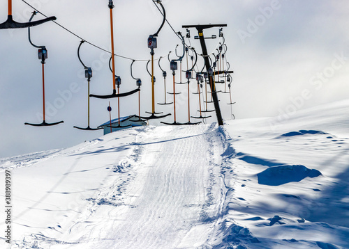 Drag lift no people, ski resort closed. Concept: pandemic, lockdown, covid-19