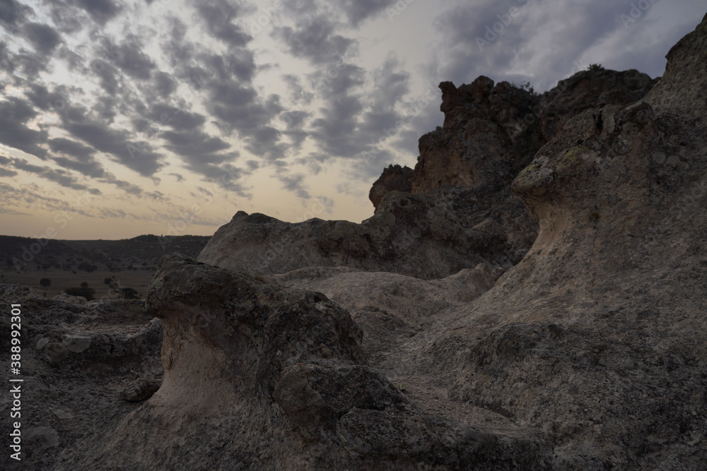 Obraz premium Sunset rain clouds in the rocky landscape in Phrygian Valley Park