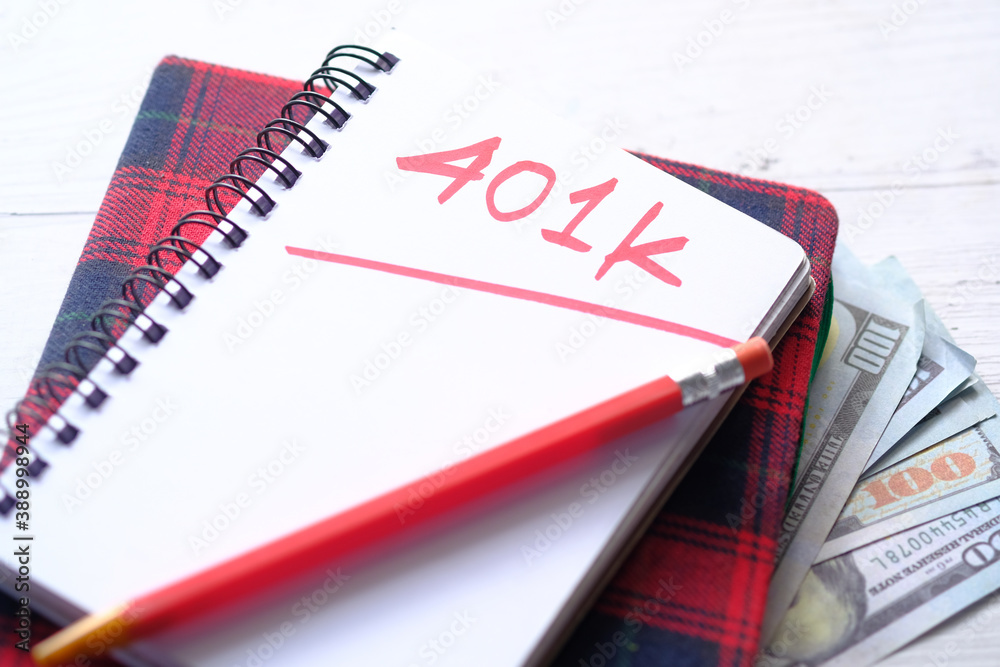 Notepad with word 401k on white background, close up , Notepad with word 401k on white background, close up ,