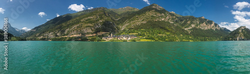 Mountain lake with a village in the background © Gustavo Palacios