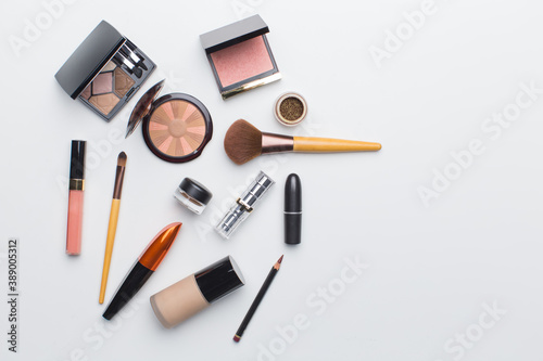 Cosmetics and brushes, lipstick, bronzer, eye shadows and etc.