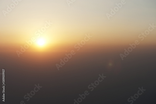 Sun and sky in the Himalayas  mountains  air haze  sunset and sunrise
