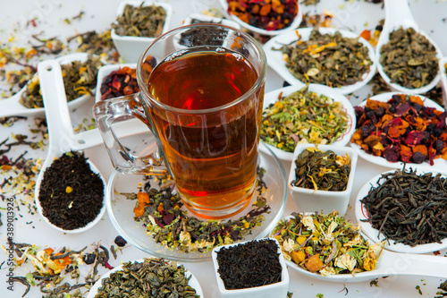 Assortment of dry tea. Various kinds of tea isolated on white.Different kinds of tea leaves. Tea composition with different kind of tea. Tea concept. Tea leaves