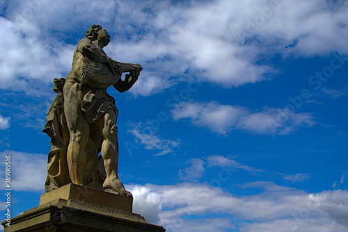 Romantic stone statue with the sky in the background