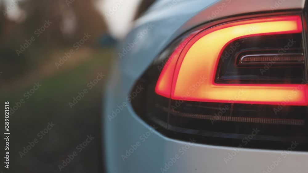 Car emergency light signal, warning sign. Emergency flashing car rear light lamp. Nobody around to help Car emergency light signal, warning sign. Emergency flashing car rear light lamp. Nobody around to help