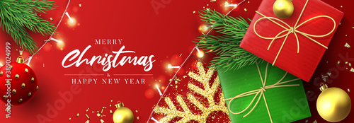 Merry Christmas and Happy New Year banner. Holiday background with realistic gift boxes, Christmas balls, sparkling light garlands, fir-tree branches, snowflakes and confetti. Vector illustration.