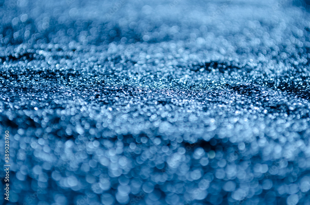 Obraz premium Dark blue abstract bokeh background.