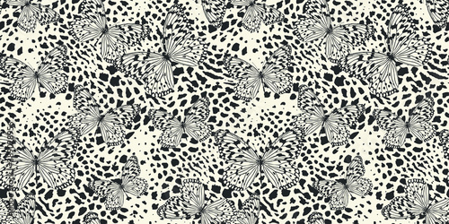 Seamless vector multicolor butterflies pattern. Butterfly on leopard print. Trendy animal motif wallpaper. Fashionable background for fabric, textile, design, banner, cover, web etc.