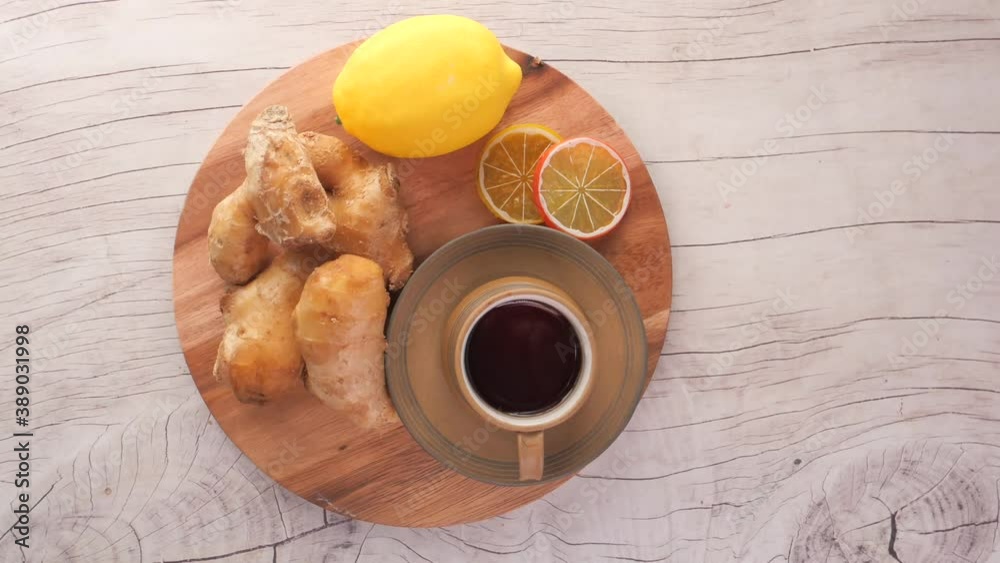 Top view of ginger tea on wooden background. Top view of ginger tea on wooden background.