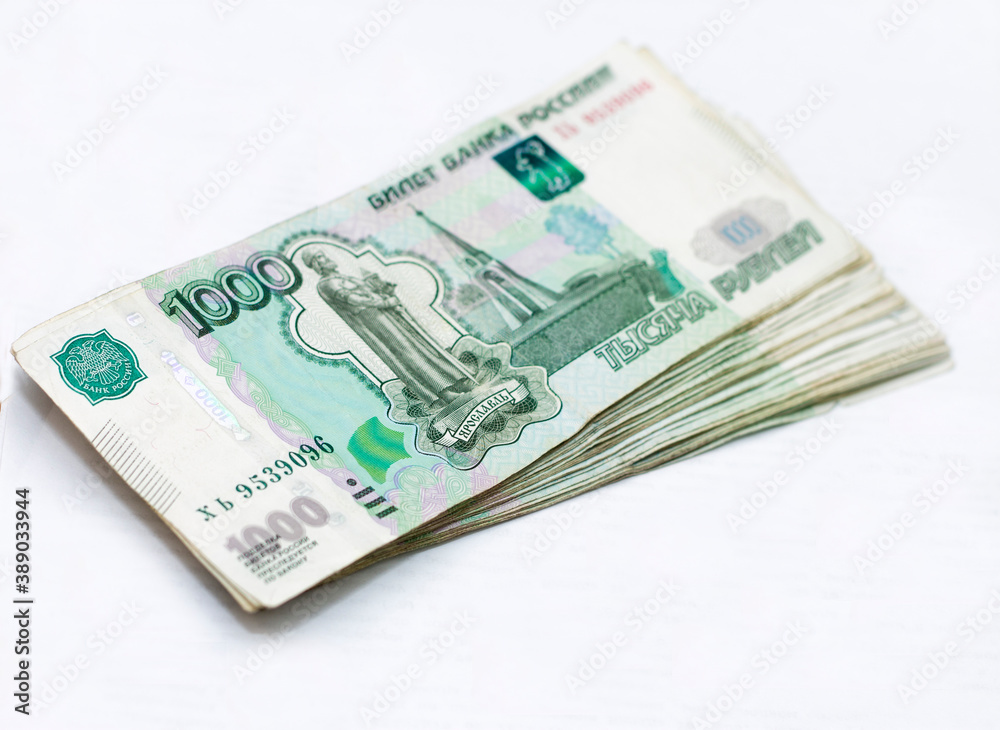 Scattered Russian 1000 rubles banknotes closeup Scattered Russian 1000 rubles banknotes closeup