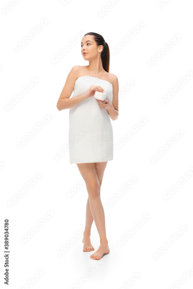 Beautiful woman with mouisturizer isolated on white background. Beauty, cosmetics, spa, depilation, treatment and health concept. Fit and sportive, sensual body with well-kept skin in towel. Copyspace Beautiful woman with mouisturizer isolated on white background. Beauty, cosmetics, spa, depilation, treatment and health concept. Fit and sportive, sensual body with well-kept skin in towel. Copyspace
