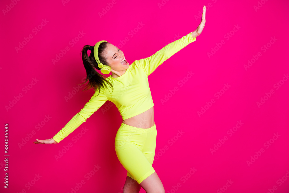 Portrait of her she nice attractive lovely carefree cheerful cheery girl listening pop music enjoying dancing having fun good mood isolated bright vivid shine vibrant pink fuchsia color background Portrait of her she nice attractive lovely carefree cheerful cheery girl listening pop music enjoying dancing having fun good mood isolated bright vivid shine vibrant pink fuchsia color background