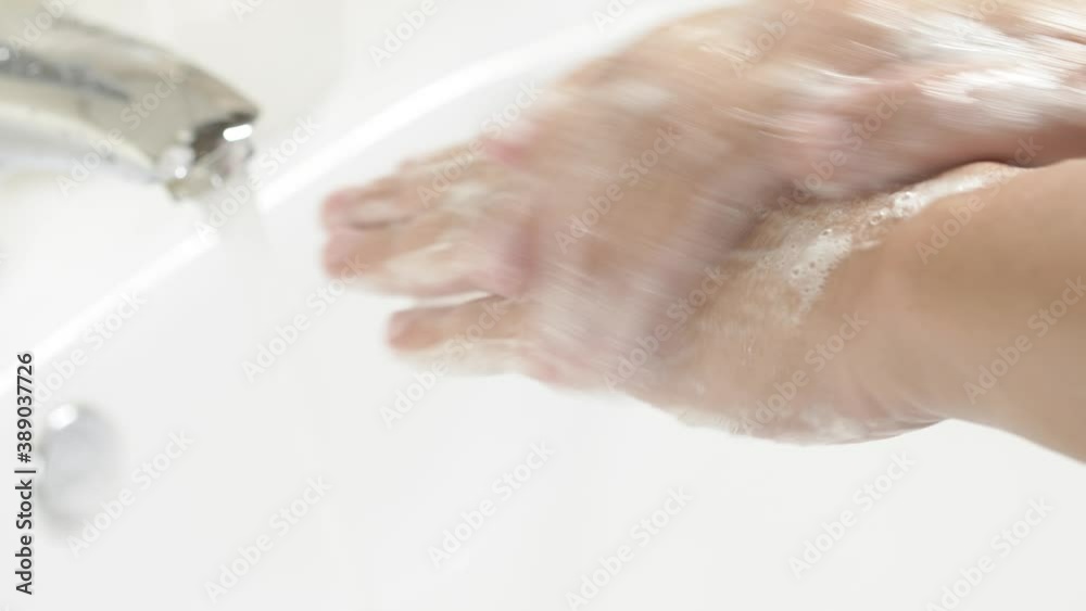 Man washing hands with sanitizer gel soap and water for prevention of coronavirus Covid-19 virus Man washing hands with sanitizer gel soap and water for prevention of coronavirus Covid-19 virus