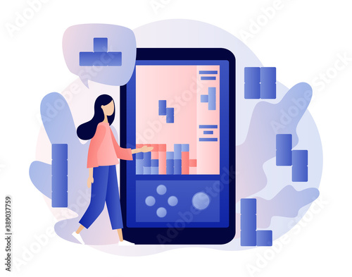 Tetris game app. Tiny girl playing retro game using smartphone. Modern flat cartoon style. Vector illustration on white background 