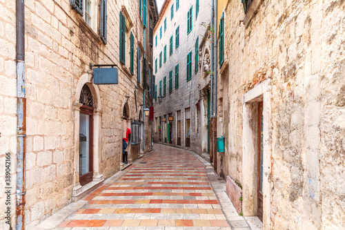 Narrow European street in the Old Town of Kotor, Montenegro © AlexAnton