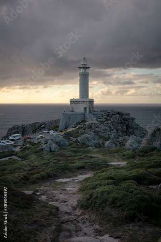 Vertical photo of the Punta Nariga lighthouse in Galicia, Spain