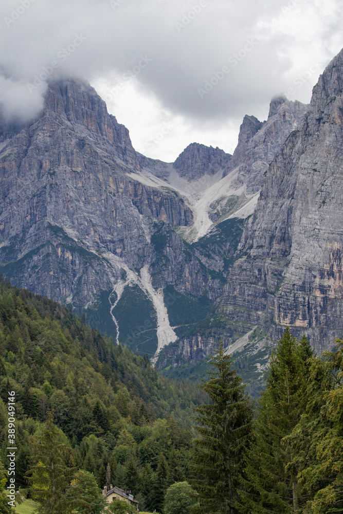 Fototapeta premium Dolomites, Brenta. Beautiful foggy day in cold summer day in Moveno, Italy