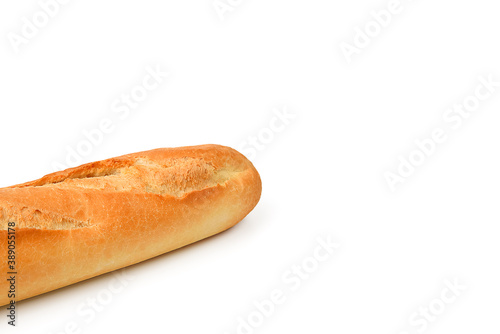 Fresh baguette loaf long on white background, isolated with shadow.