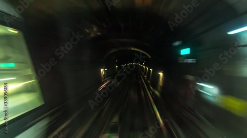 Moving through subway tunnel with rails timelapse in Paris. Shot from metro train cabin