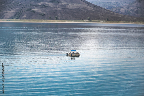 Pontoon boat floating in the Blue Mesa Reservoir