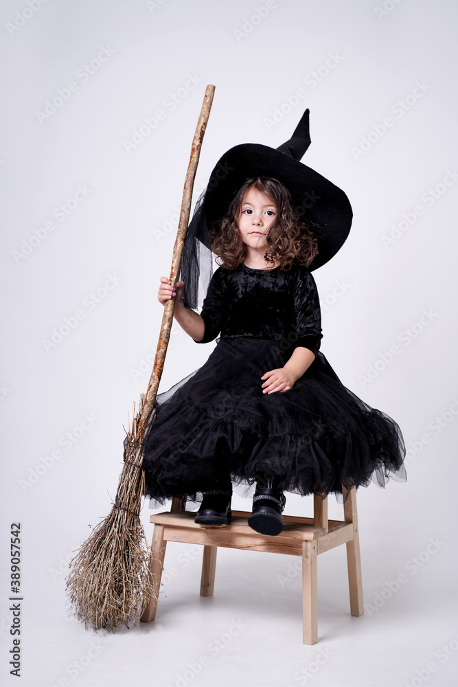 funny witch girl on white background with broom funny witch girl on white background with broom