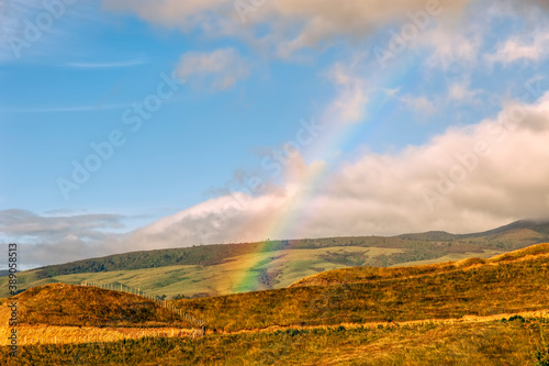 Rainbow over field © amelie