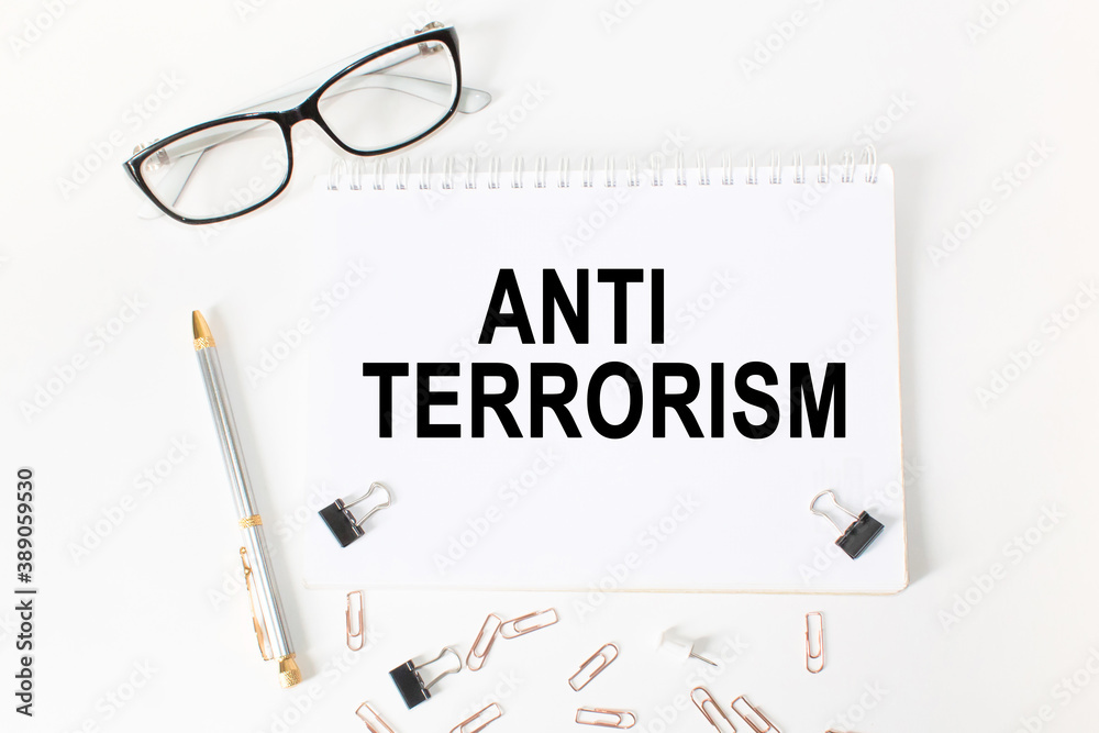 text ANTI TERRORISM in a magnifying glass, office concept, business concept, Finance text ANTI TERRORISM in a magnifying glass, office concept, business concept, Finance